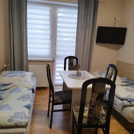 Δωμάτια σε οικογενειακή κατοικία Szyper